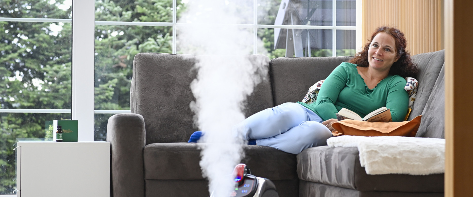 A woman enjoys her free time with a book and the Thermostar evaporator